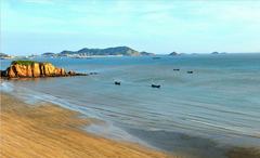看罢海天踏浪归