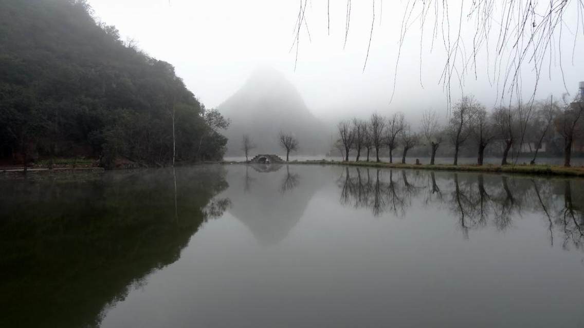 晨雾下的普者黑拍摄于云南省丘北县普者黑银湖大酒店